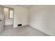 Neutral bedroom boasts gray carpet, white walls, and a view to other rooms at 11837 Meadowood Ln, Parker, CO 80138