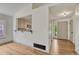 An open concept living room, with hardwood floors and natural light at 11837 Meadowood Ln, Parker, CO 80138
