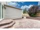 Stamped concrete patio with low maintenance backyard is great for entertaining at 11837 Meadowood Ln, Parker, CO 80138