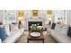 Sophisticated living room with a fireplace, plush seating, and elegant decor at 141 N Gilpin St, Denver, CO 80218
