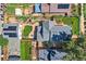 Aerial view of a home showing the roof, patio area with outdoor furniture and a well maintained backyard at 4883 Perry St, Denver, CO 80212