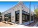 Charming Allegro Coffee Roasters facade with outdoor seating, perfect for enjoying a sunny afternoon at 4883 Perry St, Denver, CO 80212