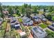Aerial image displays the home's back patio, landscaped garden, and solar panels, highlighting its sustainable features at 4883 Perry St, Denver, CO 80212