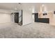 Finished basement featuring new carpet and a bar at 170 W Midway Blvd, Broomfield, CO 80020