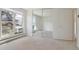 Bedroom featuring mirrored closet doors and ample natural light at 1755 S Yampa Way, Aurora, CO 80017