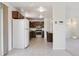 Bright open kitchen with stainless steel appliances and wood cabinets, perfect for cooking at 1755 S Yampa Way, Aurora, CO 80017