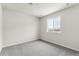 Simple bedroom with grey carpet, one window and neutral walls at 17751 E 93Rd Ave, Commerce City, CO 80022