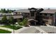 Impressive view of the well maintained building with stone details and inviting entrance at 13661 E Marina Dr # 406, Aurora, CO 80014