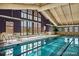 Indoor pool with abundant natural light and an inviting atmosphere for relaxation and recreation at 13661 E Marina Dr # 406, Aurora, CO 80014