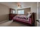 Cozy bedroom features a ceiling fan, carpet floors, and a classic wood dresser at 6271 Mcintyre Way, Golden, CO 80403