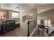 Second story living room area with high ceilings overlooks the rest of the house at 6271 Mcintyre Way, Golden, CO 80403