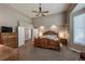 Spacious main bedroom with a vaulted ceiling and neutral color scheme provides a calm retreat at 6271 Mcintyre Way, Golden, CO 80403
