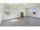 Bright bedroom with large windows, neutral walls, and soft carpet flooring at 1160 Acadia Cir, Erie, CO 80516