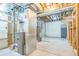 Unfinished basement featuring utilities at 119 Lake Ave, Palmer Lake, CO 80133