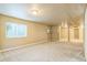 Spacious basement with carpeted floors at 119 Lake Ave, Palmer Lake, CO 80133