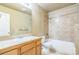 A bright full bath has tile flooring and shower-tub combo at 119 Lake Ave, Palmer Lake, CO 80133