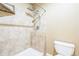 Walk-in shower features tile surround and rainfall shower head at 119 Lake Ave, Palmer Lake, CO 80133