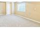 Bedroom with carpeted floors and a window at 119 Lake Ave, Palmer Lake, CO 80133