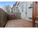 A wooden deck and fence offer a private outdoor space for relaxation or entertaining at 2005 E 103Rd Ave, Thornton, CO 80229