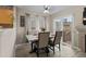 Cozy dining area featuring wood-look floors and access to the outdoor living space at 2005 E 103Rd Ave, Thornton, CO 80229