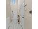 Bright entryway with wood-look floors, coat closet and neutral wall color at 2005 E 103Rd Ave, Thornton, CO 80229