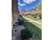 Charming townhomes featuring beautiful landscaping, lush greenery, and lovely walkway in a residential neighborhood at 1731 Quail St, Lakewood, CO 80215