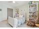 bedroom with playful decor, soft carpet, and plenty of natural light at 6281 Mcintyre Way, Golden, CO 80403