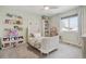 bedroom with playful decor, soft carpet, and plenty of natural light at 6281 Mcintyre Way, Golden, CO 80403