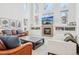 Bright, open living room with a fireplace, large windows, and comfortable seating at 6281 Mcintyre Way, Golden, CO 80403