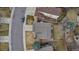 An aerial view of a home displaying the roof, backyard, and surrounding neighborhood at 5075 Weeping Willow Cir, Highlands Ranch, CO 80130