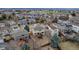 A charming neighborhood with well-kept homes, mature trees, and a community park in the background at 5075 Weeping Willow Cir, Highlands Ranch, CO 80130