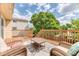 Inviting outdoor deck with wicker seating, perfect for relaxing and entertaining at 5075 Weeping Willow Cir, Highlands Ranch, CO 80130