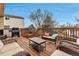 Relaxing outdoor deck with seating area, ideal for entertaining or enjoying peaceful moments outside at 5075 Weeping Willow Cir, Highlands Ranch, CO 80130