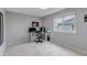 Bright office space with natural light, a modern desk setup, and plush carpeting at 5075 Weeping Willow Cir, Highlands Ranch, CO 80130