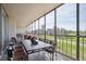 Spacious balcony with seating area, offering city skyline and golf course views at 1201 N Williams St # 4C, Denver, CO 80218