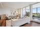 Inviting living room featuring modern decor and seamless access to a private outdoor balcony at 1201 N Williams St # 4C, Denver, CO 80218