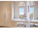 Bright office nook with built-in desk and cabinetry, providing a functional workspace at 1201 N Williams St # 4C, Denver, CO 80218