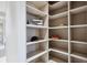 Spacious walk-in closet with custom shelving for organized storage at 1201 N Williams St # 4C, Denver, CO 80218