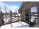 Balcony with snowy views and glass sliding door at 34 Highfield Trl # 307, Breckenridge, CO 80424