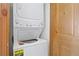 Laundry room with stacked washer and dryer unit at 34 Highfield Trl # 307, Breckenridge, CO 80424