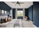 Spacious bedroom with large windows, providing ample natural light and views at 3473 Beeler St, Denver, CO 80238