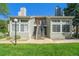 The property boasts a well-maintained lawn and inviting stairs leading to the upper level entrance at 4076 S Carson St # H, Aurora, CO 80014