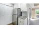 View of the refrigerator and kitchen storage at 4076 S Carson St # H, Aurora, CO 80014