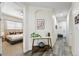 Inviting hallway with stylish decor leading to a comfortable bedroom, creating a welcoming atmosphere at 2100 N Humboldt St # 208, Denver, CO 80205