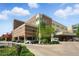 Exterior of a modern hospital featuring an emergency entrance and parking area at 2100 N Humboldt St # 208, Denver, CO 80205