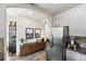 Contemporary kitchen with stainless steel appliances and granite countertops, adjacent to living area at 2100 N Humboldt St # 208, Denver, CO 80205