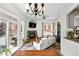 Open-concept living space with dining area, fireplace, and access to the balcony at 2100 N Humboldt St # 208, Denver, CO 80205