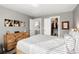 Spacious primary bedroom with large bed and walk-in closet at 12844 W Cross Dr, Littleton, CO 80127