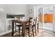 Bright dining area with sliding glass door access to backyard at 12844 W Cross Dr, Littleton, CO 80127