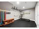 Basement home gym with treadmill and other equipment at 12844 W Cross Dr, Littleton, CO 80127